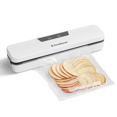 White FoodSaver Everyday VS0230 with an example apple-filled heat-seal bag